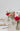 small wedding table decorations with three bud vases in vibrant colours full of bold bright colours from Manchester wedding florist The Flower Lounge.